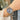 The NZ Wall - Couple's quartz wristwatches, ice blue dials, calendar feature, and stainless steel bands, in blue color.