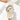 The NZ Wall - Women's student quartz watch, soft silicone strap, round dial, 8mm thickness, in beige color.