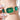The NZ Wall - Women's Fashion shape watch with stone bracelet, gold-tone case & links, stylish & luxurious, in Emerald colour.