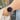 The NZ Wall - Couple's quartz wristwatches, ice blue dials, calendar feature, and stainless steel bands, in blue color.
